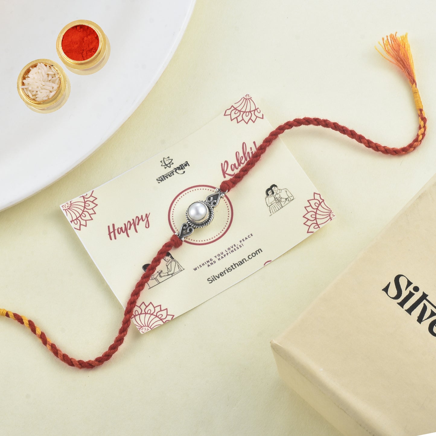 Silver Spiral Pearl rakhi