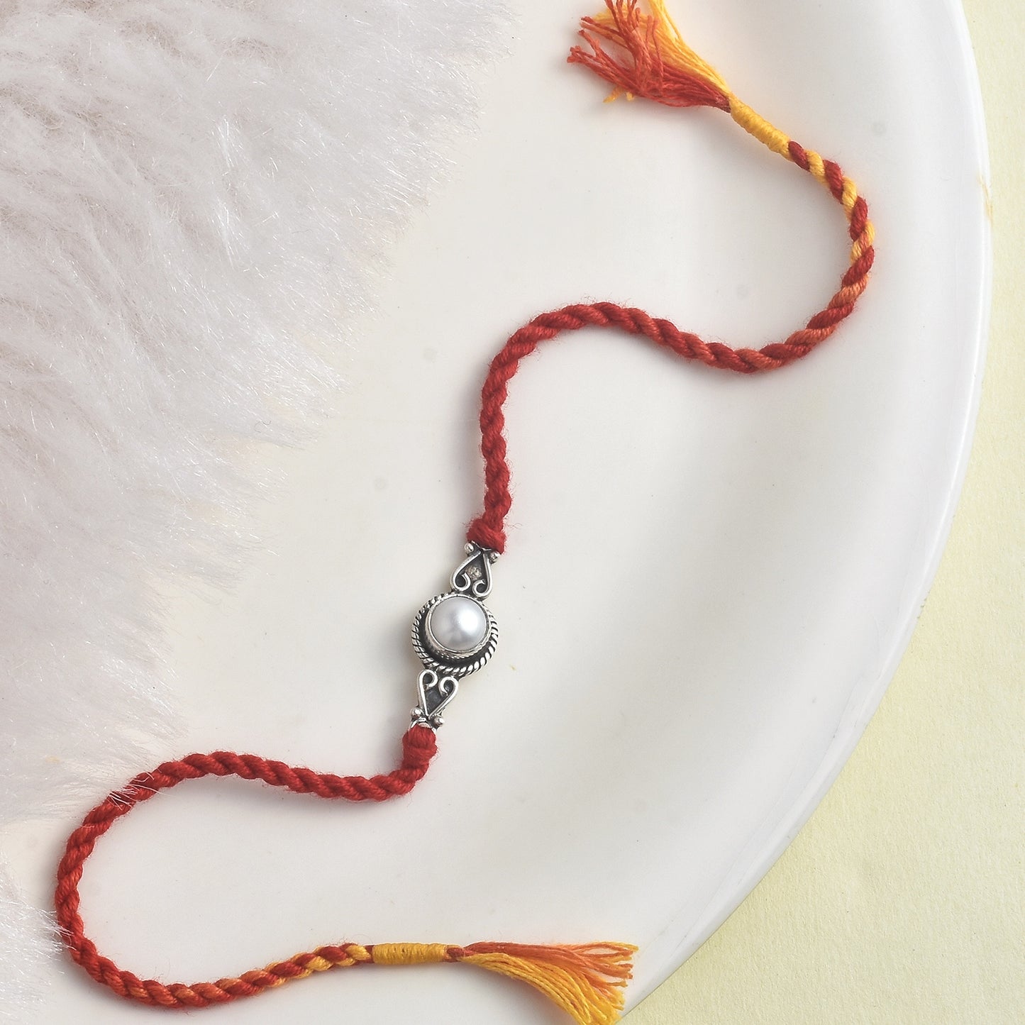 Silver Spiral Pearl rakhi