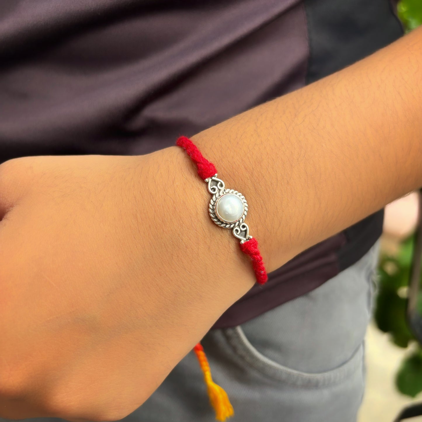 Silver Spiral Pearl rakhi