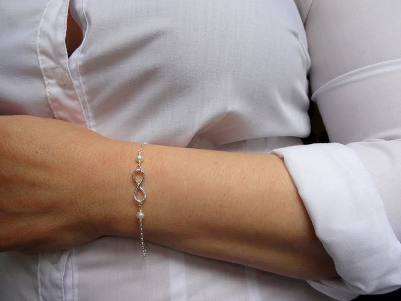 Silver infinity pearl bracelet