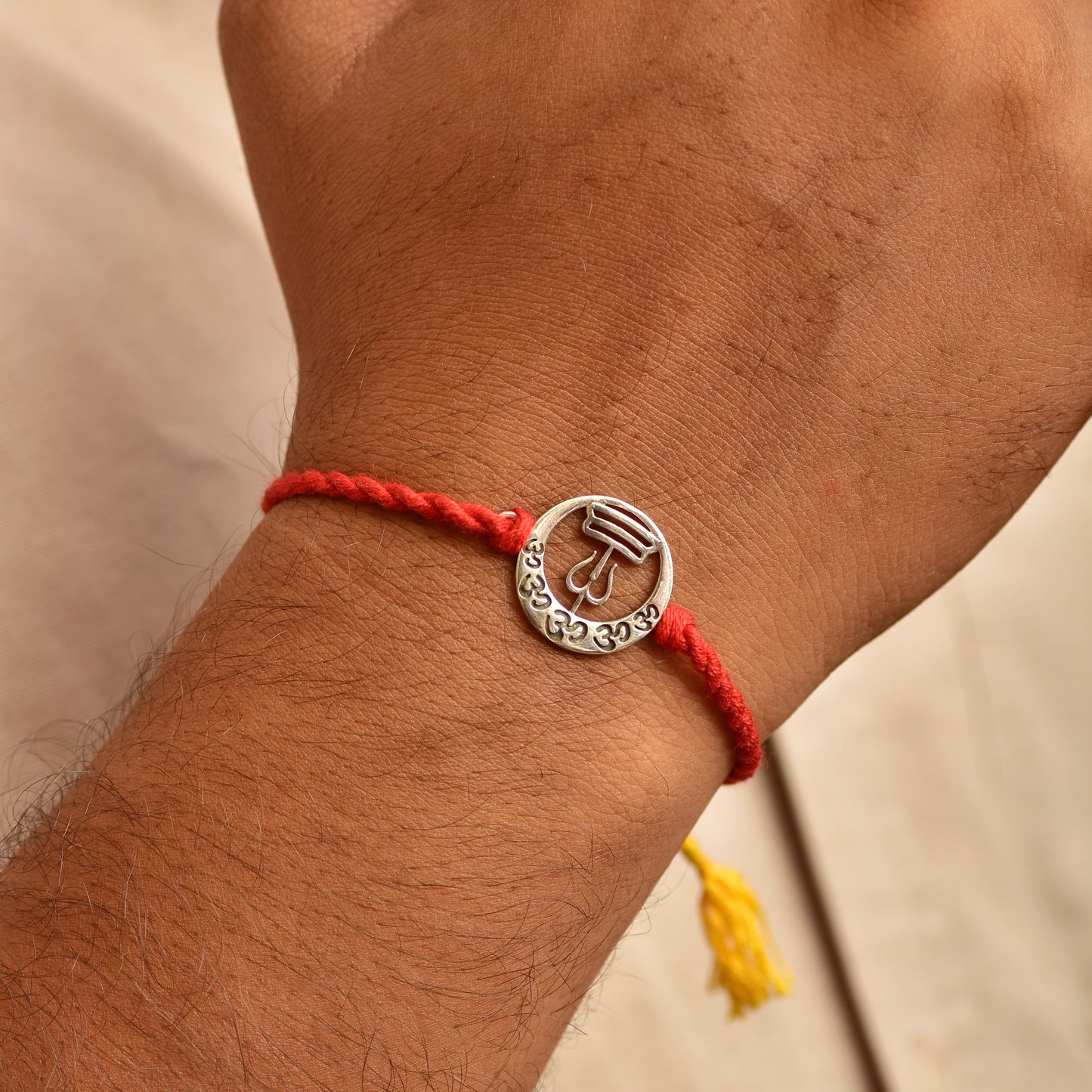 Silver Om trident Rakhi