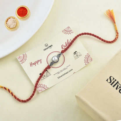 Silver Spiral Pearl rakhi
