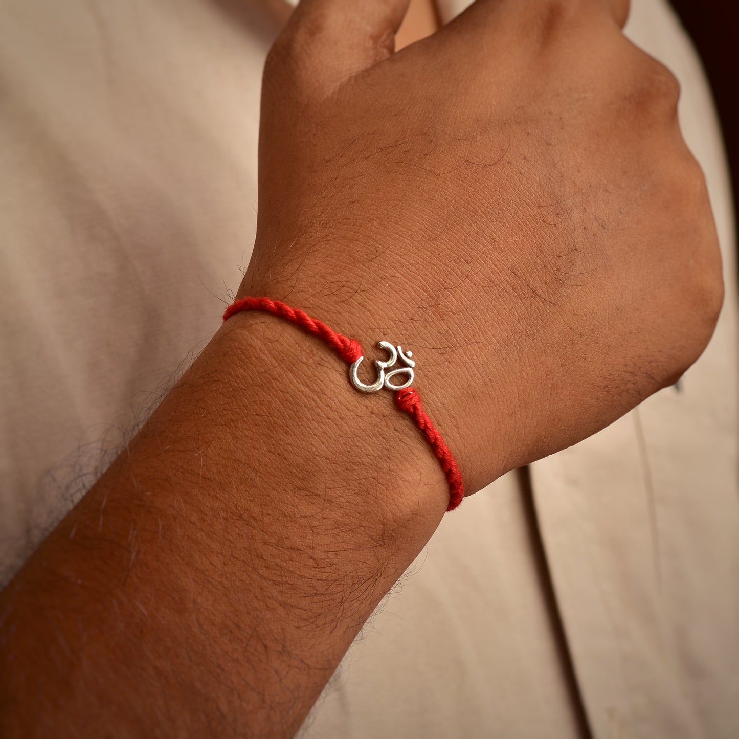 Silver Om Rakhi
