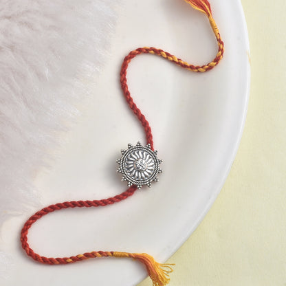 Silver Suraj rakhi cum brooch