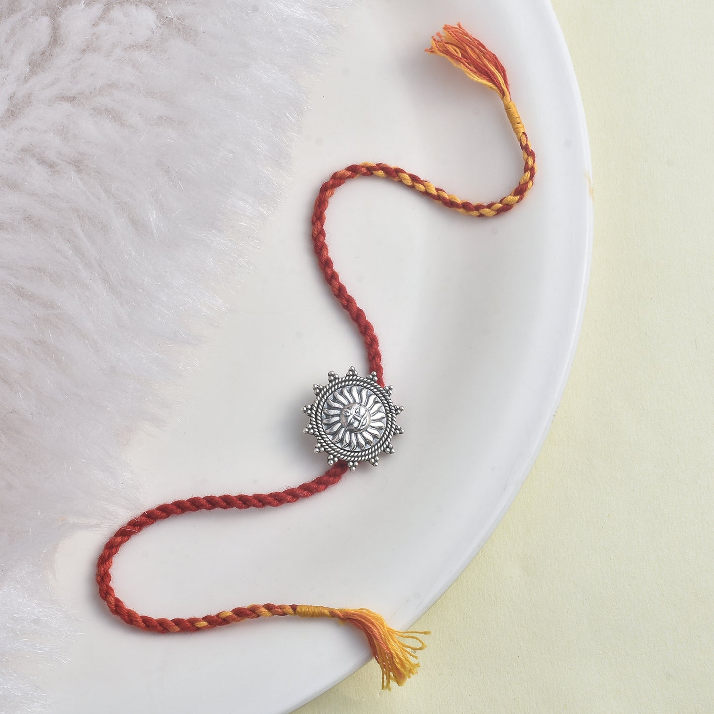 Silver Suraj rakhi cum brooch