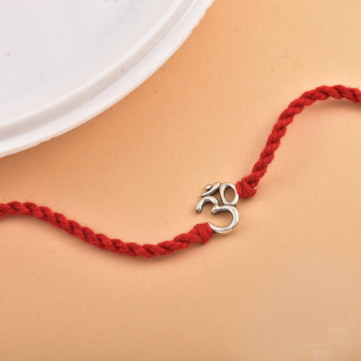 Silver Om Rakhi